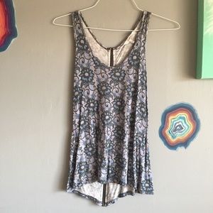 Kiva S floral, stretchy, knit, zipper-back tank.